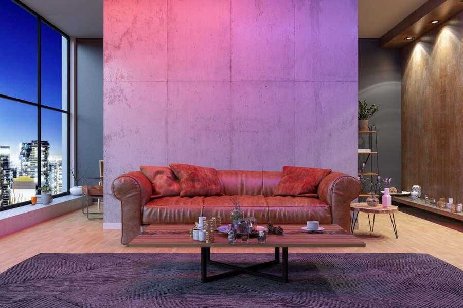 A beautiful living room is bathed in purple and pink lighting. 